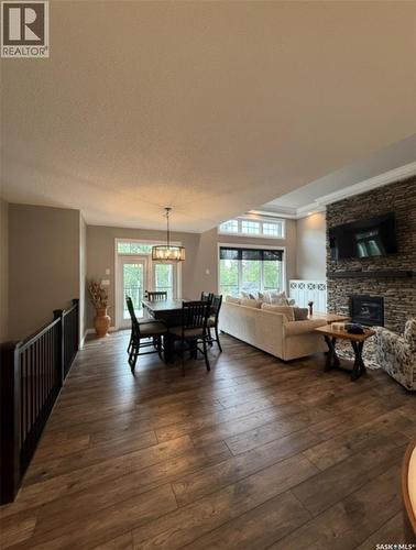214 Hillside Drive, Tobin Lake, SK - Indoor Photo Showing Living Room With Fireplace