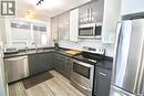 3920 Montague Street, Regina, SK  - Indoor Photo Showing Kitchen With Stainless Steel Kitchen With Double Sink With Upgraded Kitchen 