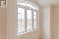 Window in front bedroom over garage - 