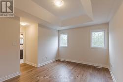 Tray ceiling in primary bedroom is standard - 