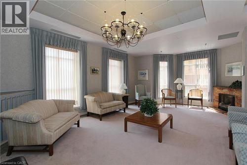 1414 E King Street E Unit# 808, Kitchener, ON - Indoor Photo Showing Living Room With Fireplace