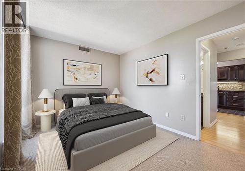 Staged Bedroom Photo - 1414 E King Street E Unit# 808, Kitchener, ON - Indoor Photo Showing Bedroom