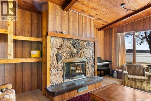 446 Pasqua Lake Road, North Qu'Appelle Rm No. 187, SK - Indoor Photo Showing Living Room With Fireplace