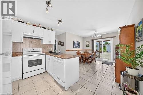 156 E Simcoe Street E, Hamilton, ON - Indoor Photo Showing Kitchen With Double Sink