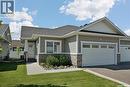 4 437 Palmer Crescent, Warman, SK  - Outdoor With Facade 