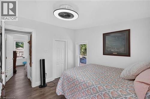Room featuring white walls and wood-finish flooring - 9 Davidson Street, Cambridge, ON - Indoor Photo Showing Bedroom