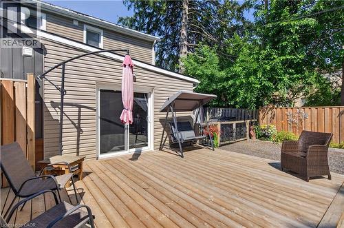 Spacious wood deck with a privacy fence and gravel patio - 9 Davidson Street, Cambridge, ON - Outdoor With Deck Patio Veranda With Exterior