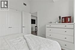 White two-panel interior doors with brushed nickel hardware - 