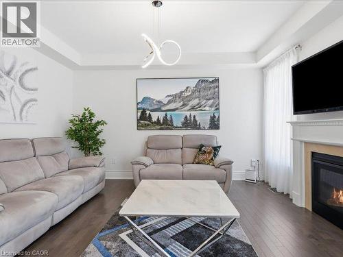 39 Avanti Crescent, Waterdown, ON - Indoor Photo Showing Living Room With Fireplace