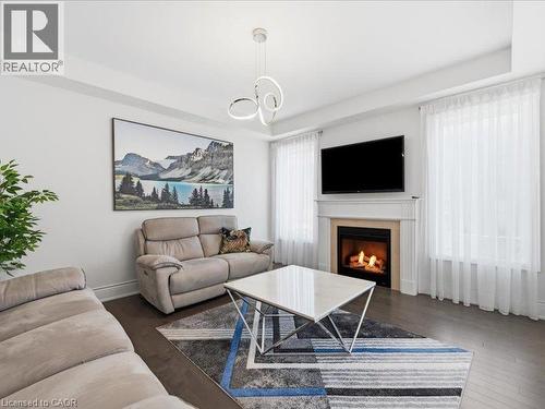 39 Avanti Crescent, Waterdown, ON - Indoor Photo Showing Living Room With Fireplace