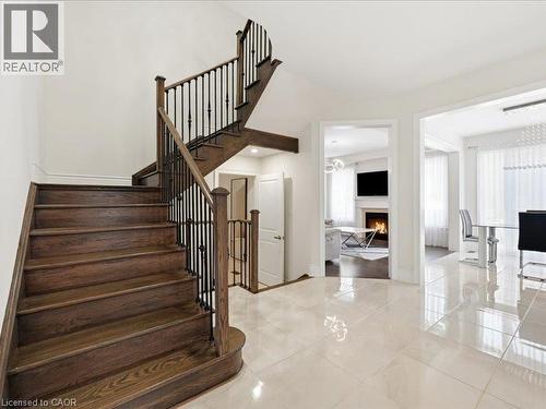 39 Avanti Crescent, Waterdown, ON - Indoor Photo Showing Other Room With Fireplace