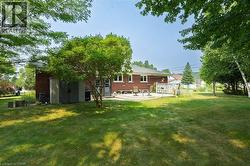 Expansive green lawn providing ample outdoor space - 