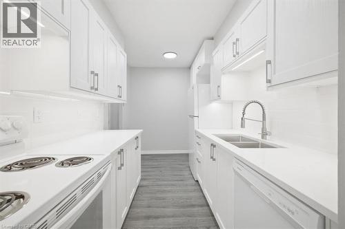 1968 Main Street W Unit# 404, Hamilton, ON - Indoor Photo Showing Kitchen With Double Sink