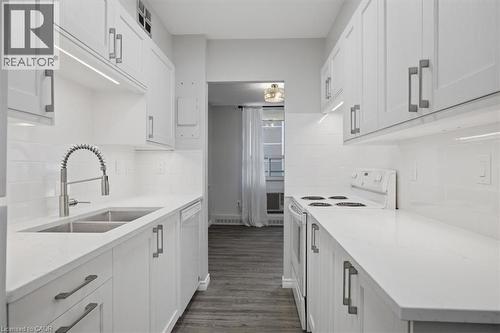 1968 Main Street W Unit# 404, Hamilton, ON - Indoor Photo Showing Kitchen With Double Sink