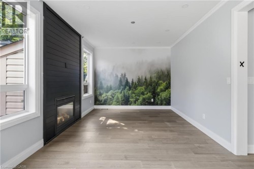 930 Lancaster Boulevard, Milton, ON - Indoor Photo Showing Other Room With Fireplace