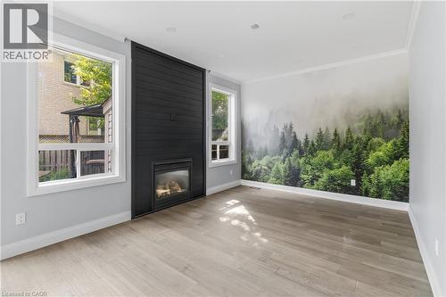 930 Lancaster Boulevard, Milton, ON - Indoor Photo Showing Living Room With Fireplace