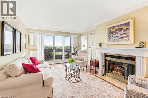1201 North Shore Boulevard E Unit# 1003, Burlington, ON - Indoor Photo Showing Living Room With Fireplace