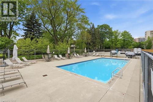 1201 North Shore Boulevard E Unit# 1003, Burlington, ON - Outdoor With In Ground Pool With Deck Patio Veranda