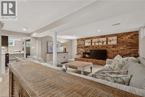302 Harmony Road, Hamilton, ON - Indoor Photo Showing Living Room With Fireplace