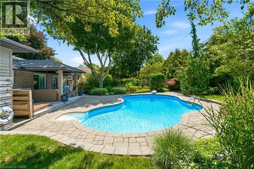 302 Harmony Road, Hamilton, ON - Outdoor With In Ground Pool With Deck Patio Veranda