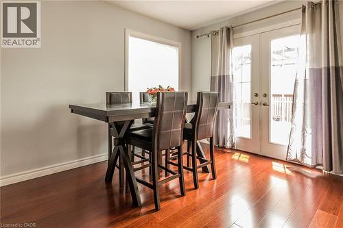 Dining area featuring rich wood-finish flooring - 44 Lemon Grass Street, Kitchener, ON - Indoor Photo Showing Dining Room