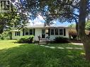 Ranch-style residence featuring white siding and dark shutters - 879 West 5Th Street, Hamilton, ON  - Outdoor With Facade 