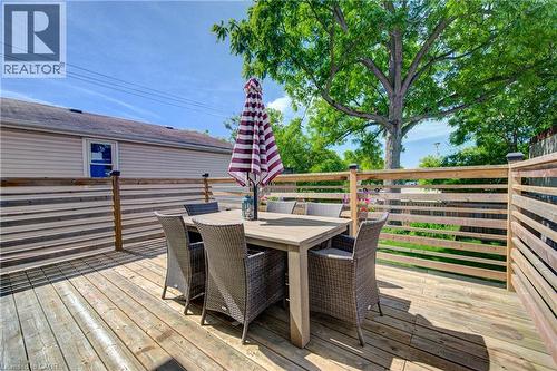 Spacious wood-plank deck featuring a slatted wood privacy fence - 39 Kerr Street, Cambridge, ON - Outdoor With Deck Patio Veranda