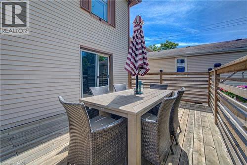 Wood-finish deck with a sliding glass door entry - 39 Kerr Street, Cambridge, ON - Outdoor With Deck Patio Veranda With Exterior