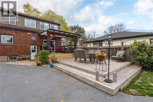 Multi-level wooden deck featuring a covered pergola and integrated steps - 851 Beach Boulevard, Hamilton, ON - Outdoor With Deck Patio Veranda