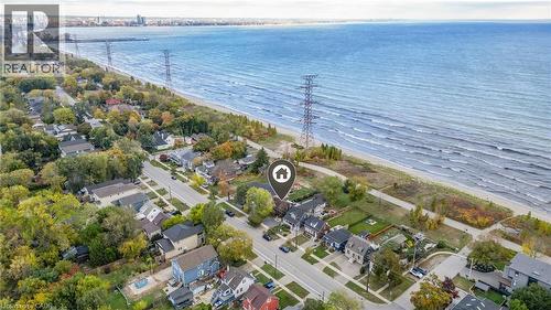 Aerial perspective showcasing the residential streetscape bordering a prominent body of water - 851 Beach Boulevard, Hamilton, ON - Outdoor With Body Of Water With View