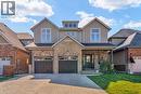 Modern two-story residence featuring a stone and siding exterior - 7 Kinsman Drive, Binbrook, ON  - Outdoor With Facade 