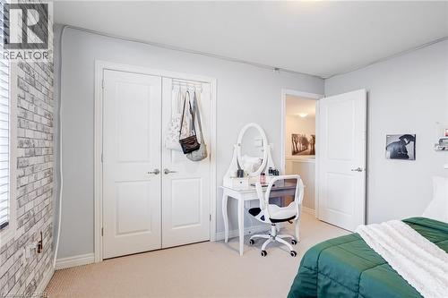 Neutral wall paint complementing soft carpet flooring - 7 Kinsman Drive, Binbrook, ON - Indoor Photo Showing Bedroom