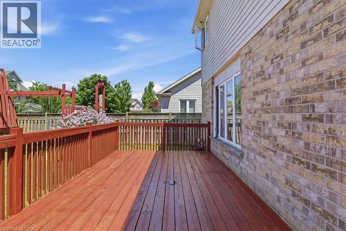 Expansive wood deck with a red stain finish - 43 Decaro Crescent, Cambridge, ON - Outdoor With Exterior