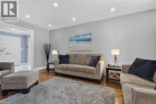 Living area featuring recessed lighting, light gray wall paint, and wood-finish flooring - 1172 Chada Avenue, Mississauga, ON - Indoor Photo Showing Living Room