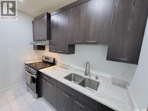 583 Kalra Street, Saskatoon, SK - Indoor Photo Showing Kitchen With Double Sink