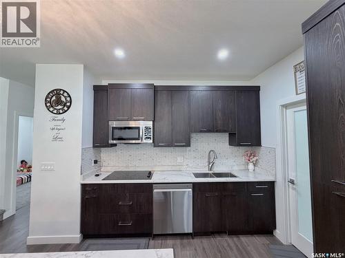 583 Kalra Street, Saskatoon, SK - Indoor Photo Showing Kitchen With Double Sink