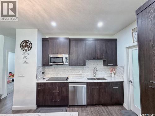 583 Kalra Street, Saskatoon, SK - Indoor Photo Showing Kitchen With Double Sink