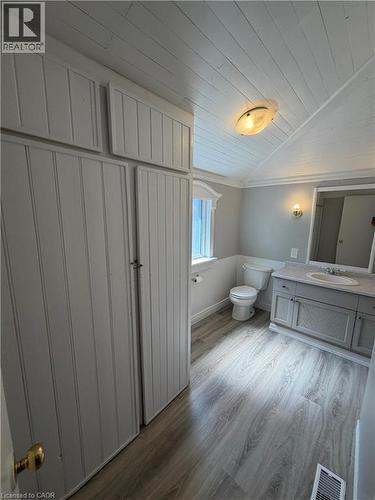 Built-in storage cabinetry with paneled doors and upper units - 104 Marshall Street, Waterloo, ON - Indoor