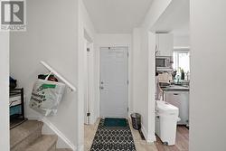 Main front foyer w 2 pc powder room. - 
