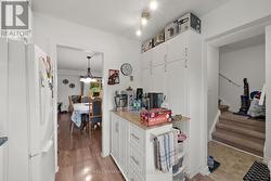 Additional pantry storage space. - 