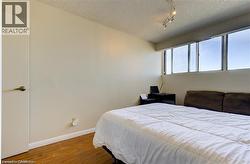 Hardwood-finish flooring complementing light-toned walls - 