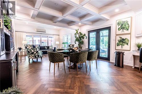 Herringbone wood-finish flooring across an open-concept living space - 76 Adriatic Boulevard, Hamilton, ON - Indoor