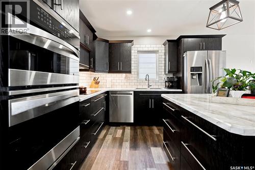 1645 Smith Street, Moose Jaw, SK - Indoor Photo Showing Kitchen With Stainless Steel Kitchen With Upgraded Kitchen
