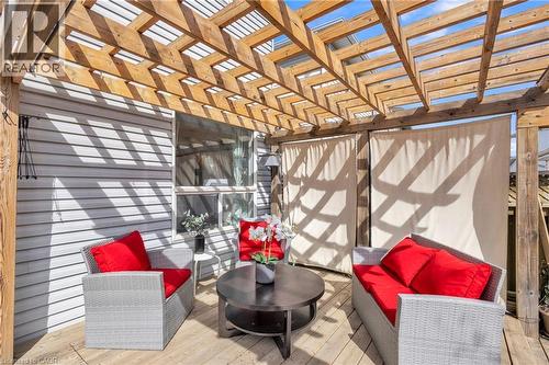 Wood deck with a slatted pergola overhead - 425 Erinbrook Drive, Kitchener, ON - Indoor