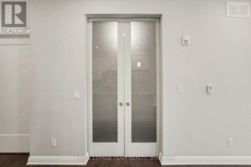 Glass double door to dining room or office - 104 - 190 Boundstone Way, Ottawa, ON - Indoor Photo Showing Other Room