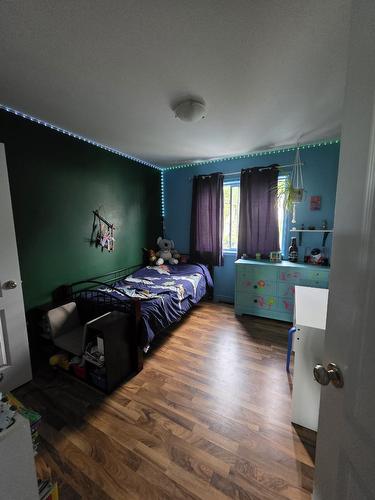 303 1St Avenue, Nakusp, BC - Indoor Photo Showing Bedroom