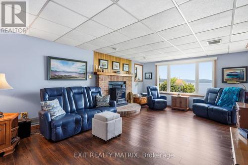 2176 Bay Road, Champlain, ON - Indoor Photo Showing Living Room With Fireplace