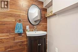 Accent wall featuring horizontal wood-finish planks - 