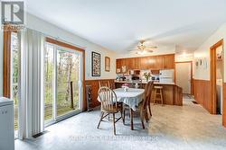 Kitchen is combined with Dining Rm & Patio Doors - 