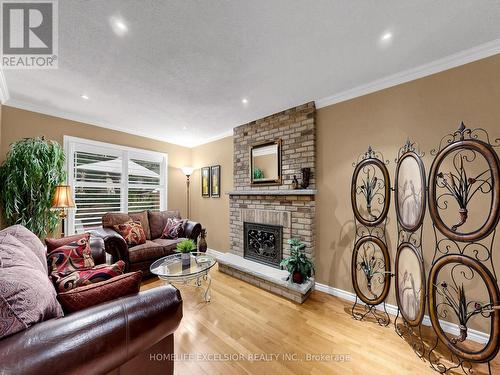 17 Black Cherry Drive, Markham, ON - Indoor Photo Showing Living Room With Fireplace